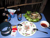 Муйне: тилапия в кафешке у дороги, темп 3 кг в час и соус