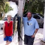 Пунта-Кана семейный выход, 10 дорадо и барракудка, гриль сделали прямо на берегу