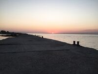 Беляус, пирс и рыбалка с дочкой: то самое летнее фото, к которому возвращаюсь