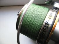 Trabucco Kronos Pro Surf 8000: намотка плетни 0.18 + монка 0.30, отступ 2 мм