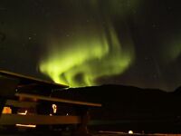 Северное сияние над Сейландом: кадр ночи и тихая вода