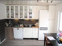 Сенья, Gryllefjord в Норвегии: шторм, пирс, ящики трески и сорванный палтус