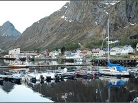 Сенья, Gryllefjord в Норвегии: шторм, пирс, ящики трески и сорванный палтус