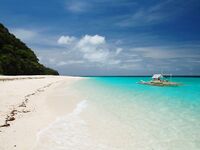 Puka Beach дал мне пустой дрейф с удочкой и спокойствие которого нет на White Beach