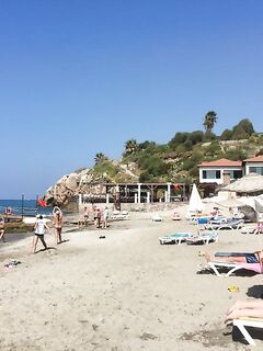 Анталийское побережье где ловить - зонтики на фото и полудикая свобода