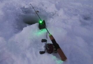Морская ловля трески со льда в Рам-фьорде и Норд-фьорде у Тромсё, Норвегия