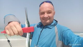 ОАЭ, Шарджа: рыбалка с пляжа у отеля на пилькеры, отводной и закидушку