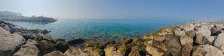 Рыбалка в ОАЭ на пилькер у входа в канал: туман, камни и желтопятнистый тревалли
