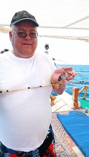 Морская рыбалка в Турции у Авсаллара: осьминог сорвался у самой поверхности