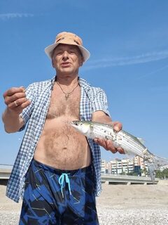 Турция, Анталья: морская рыбалка с пляжа на кефаль во время семейного отдыха